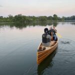 Director Sebastian Nieves films in a canoe with Rich.